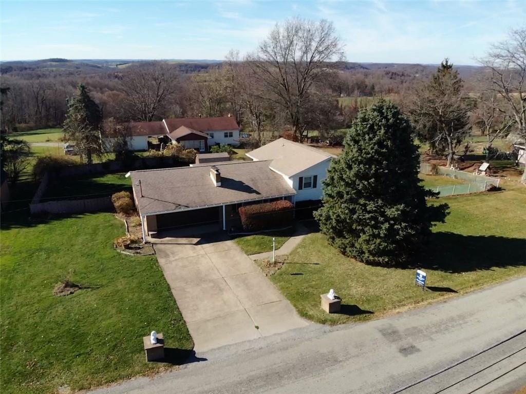 117 Cemetery Road Vanderbilt, PA 15486 - Photo 6 of 25 an aerial view of a house having yard