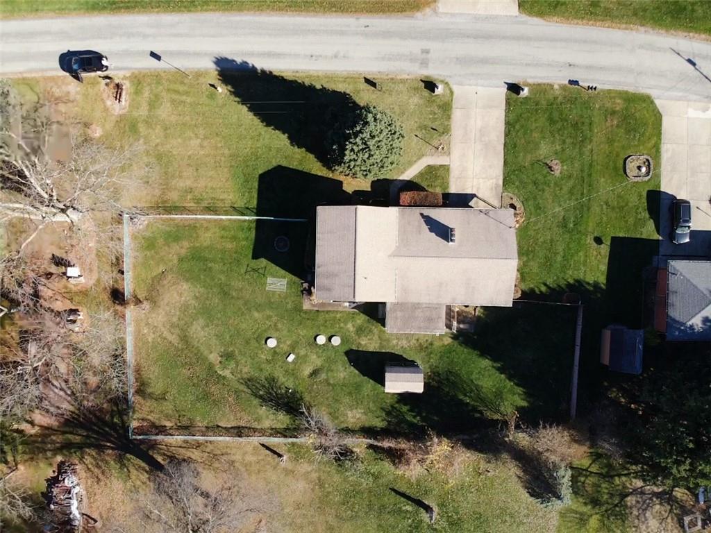 117 Cemetery Road Vanderbilt, PA 15486 - Photo 7 of 25 an aerial view of a house with a backyard