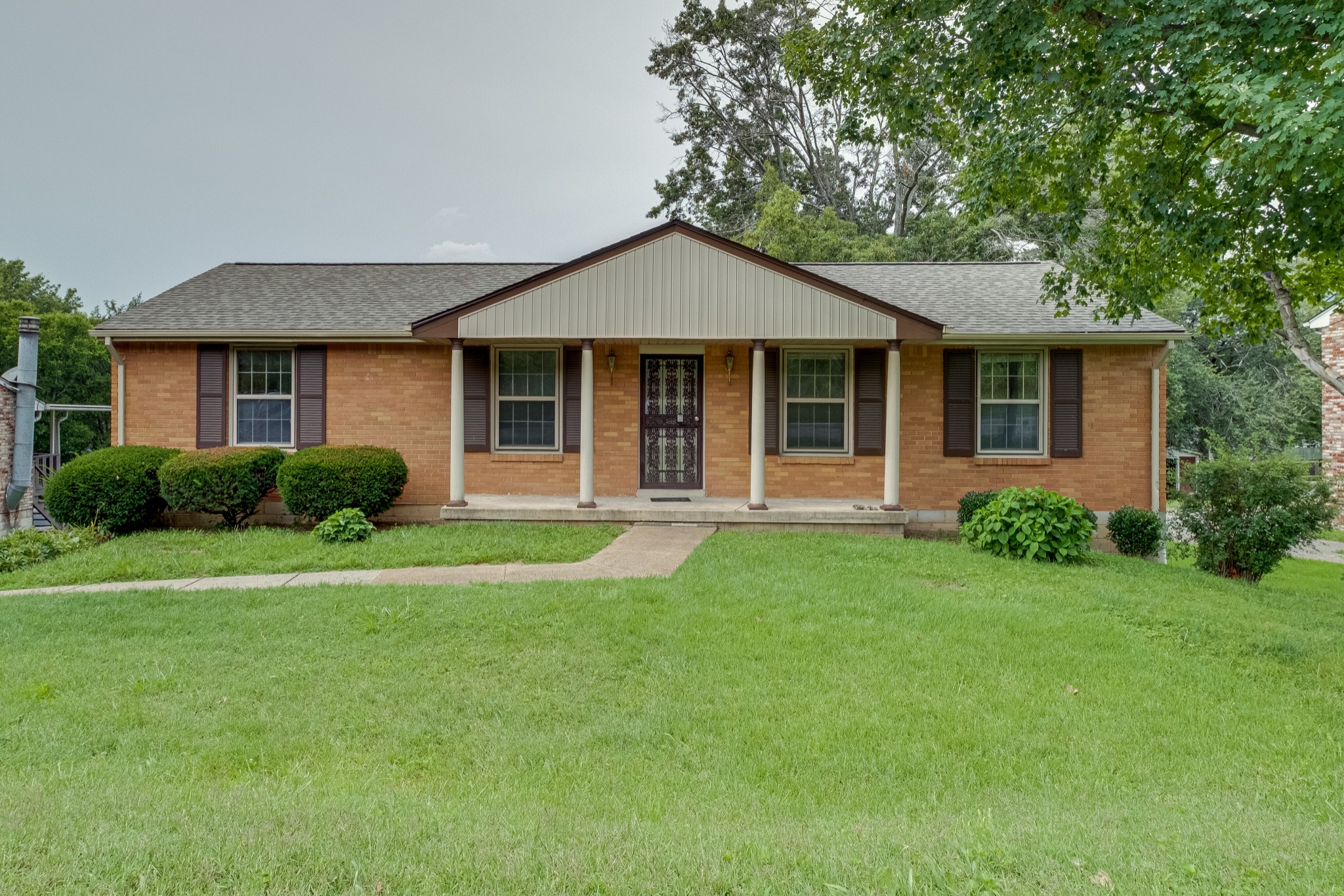 78 Tusculum Road Antioch, TN 37013 - Photo 1 of 27 a view of a house with backyard and garden