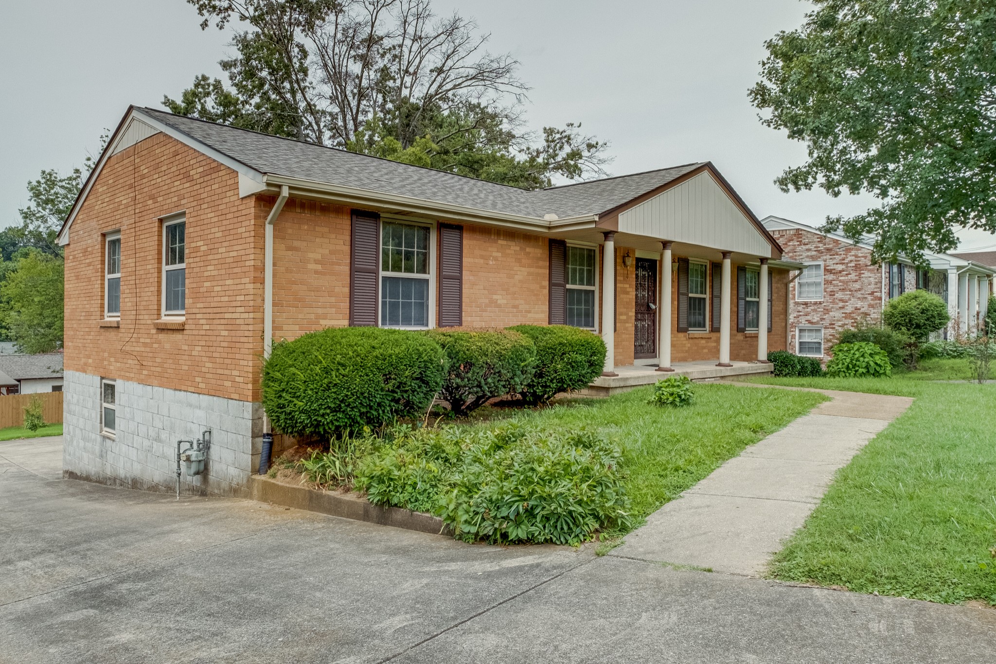 78 Tusculum Road Antioch, TN 37013 - Photo 2 of 27 a front view of a house with a yard