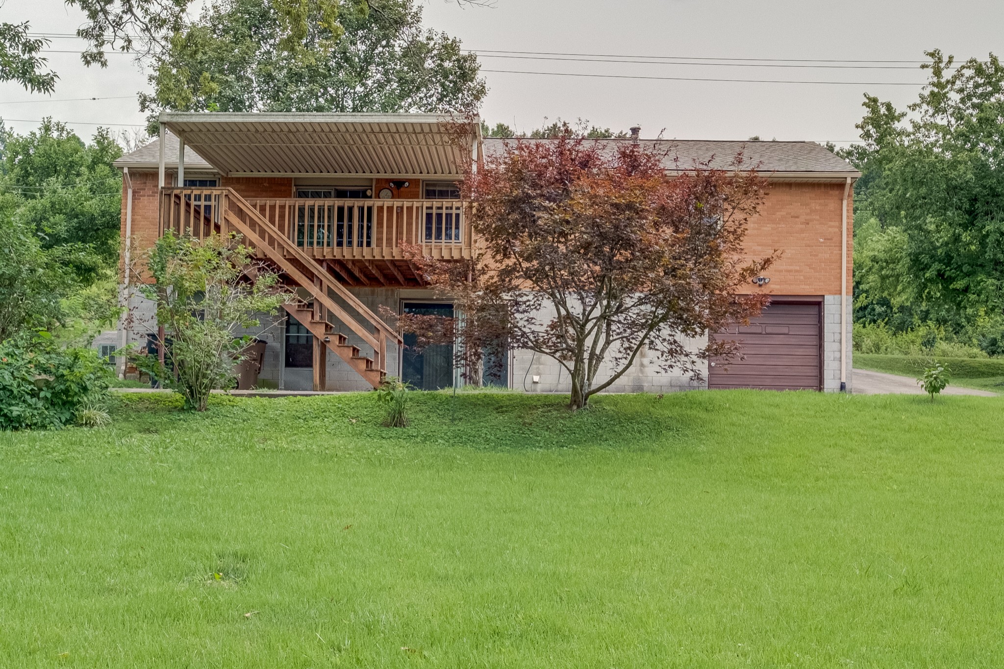 78 Tusculum Road Antioch, TN 37013 - Photo 27 of 27 a view of a house with a yard