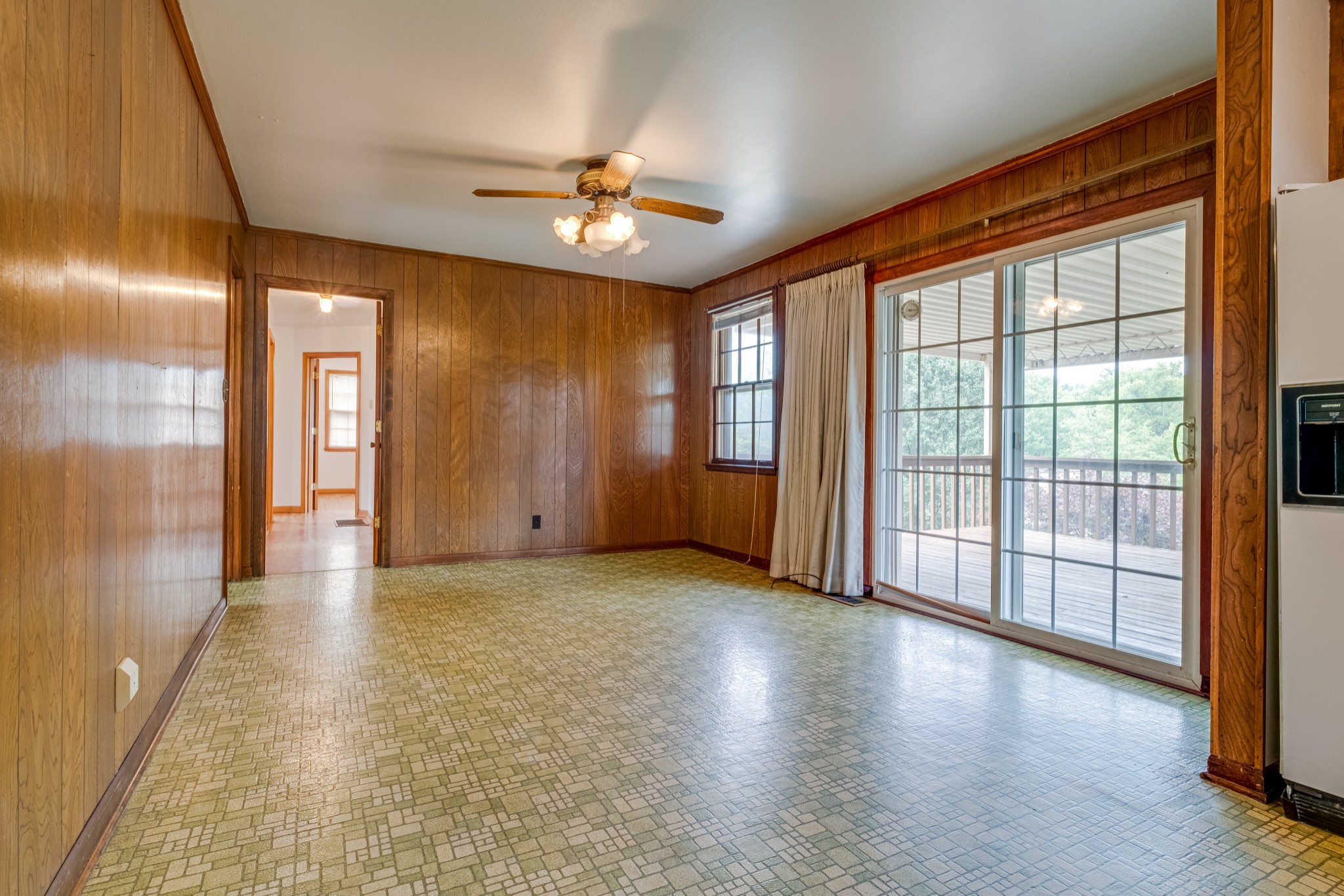 78 Tusculum Road Antioch, TN 37013 - Photo 7 of 27 a view of a livingroom with a ceiling fan and window