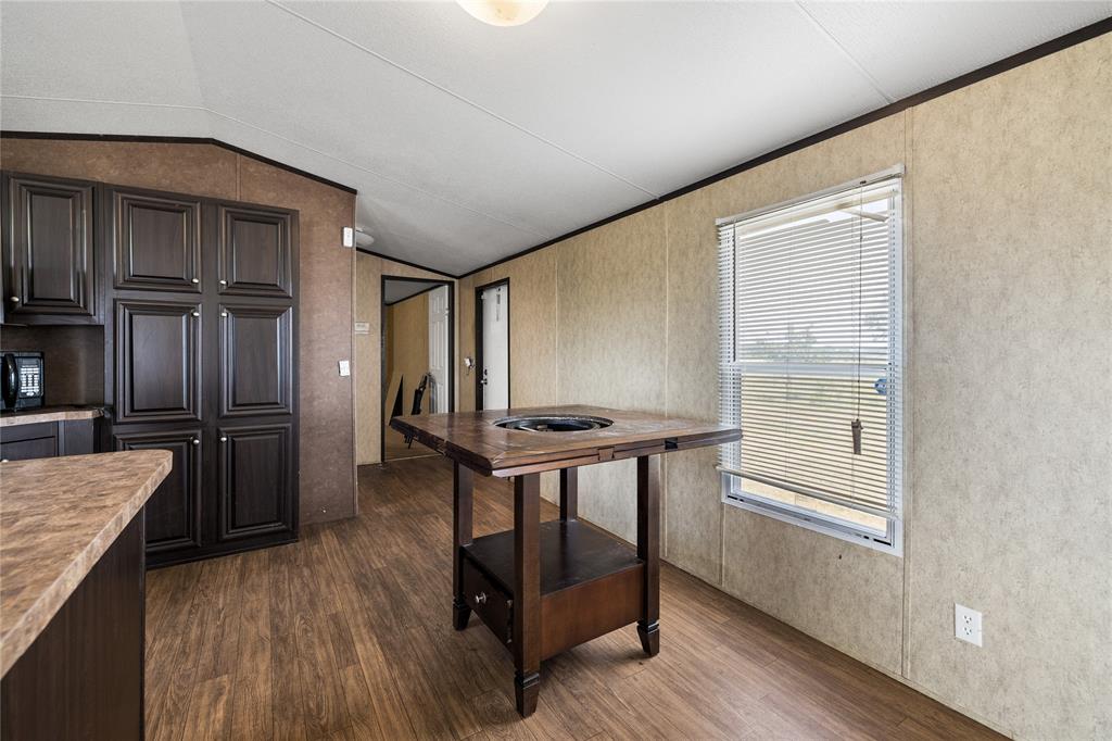 3607 Hackett Branch Road Midway, TX 75852 - Photo 15 of 21 a kitchen with stainless steel appliances granite countertop a refrigerator and a stove top oven