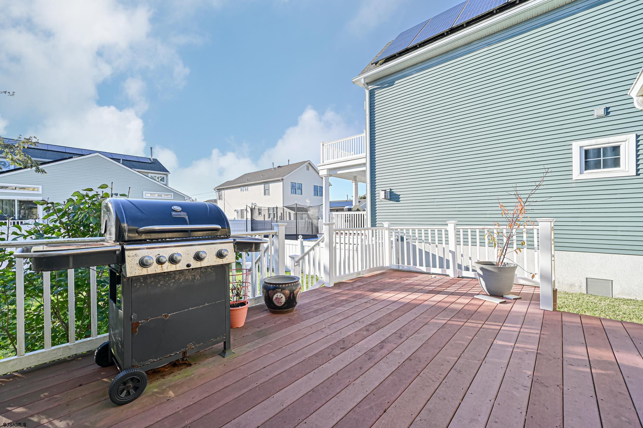 16 MacDermott Place Brigantine, NJ 08203 - Photo 20 of 37 a view of a backyard with sitting area