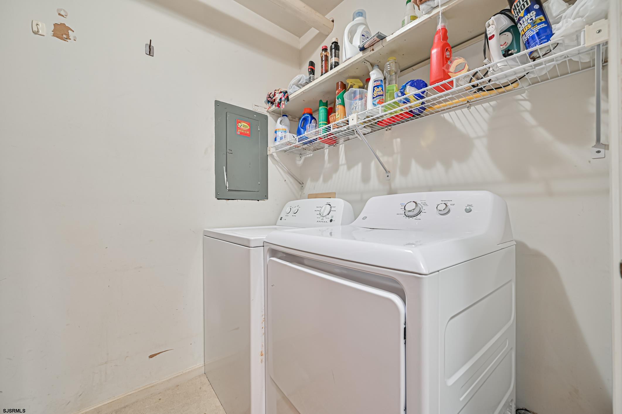 16 MacDermott Place Brigantine, NJ 08203 - Photo 28 of 37 a utility room with dryer and washer