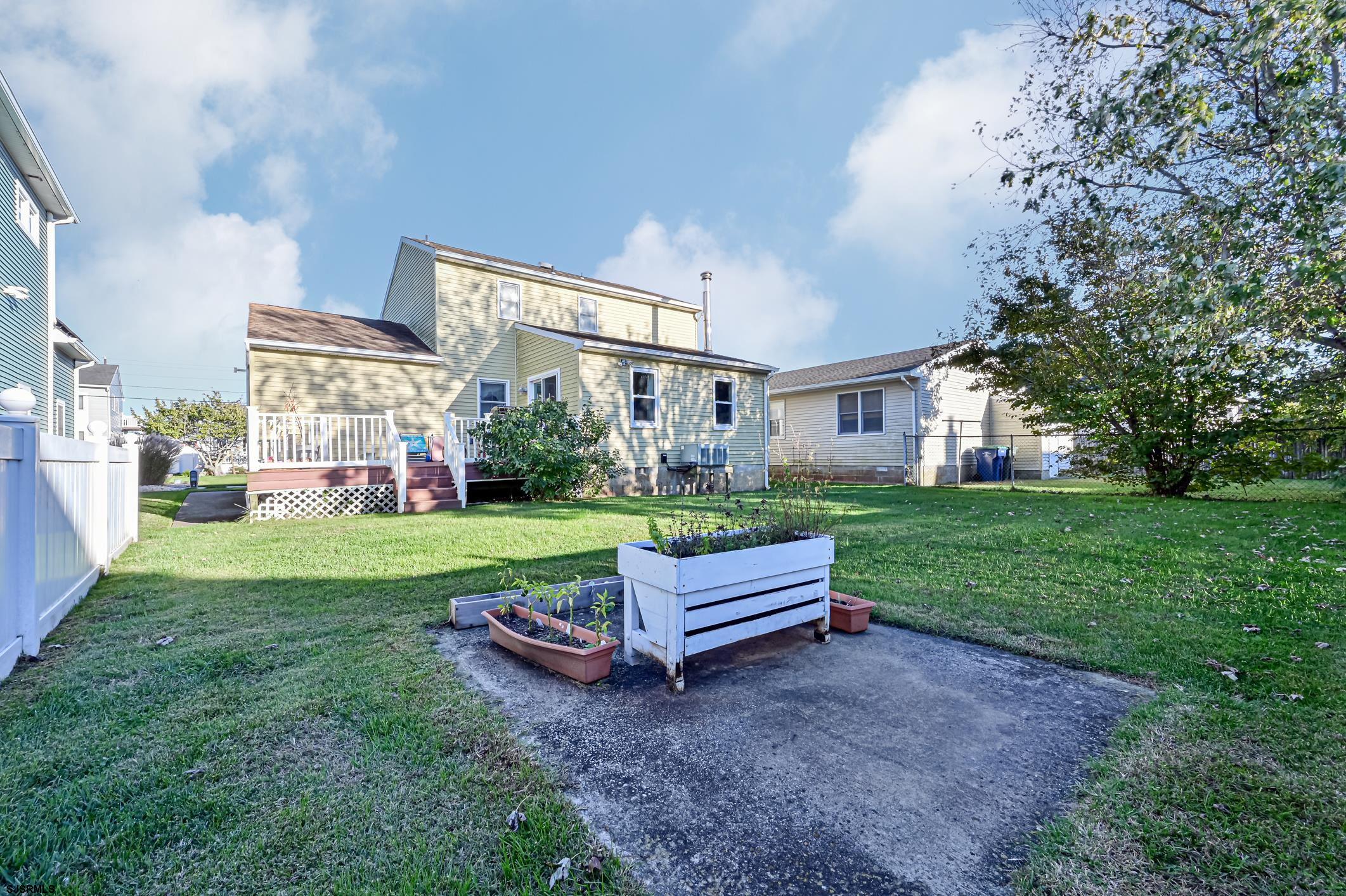 16 MacDermott Place Brigantine, NJ 08203 - Photo 31 of 37 a view of yard with outdoor seating