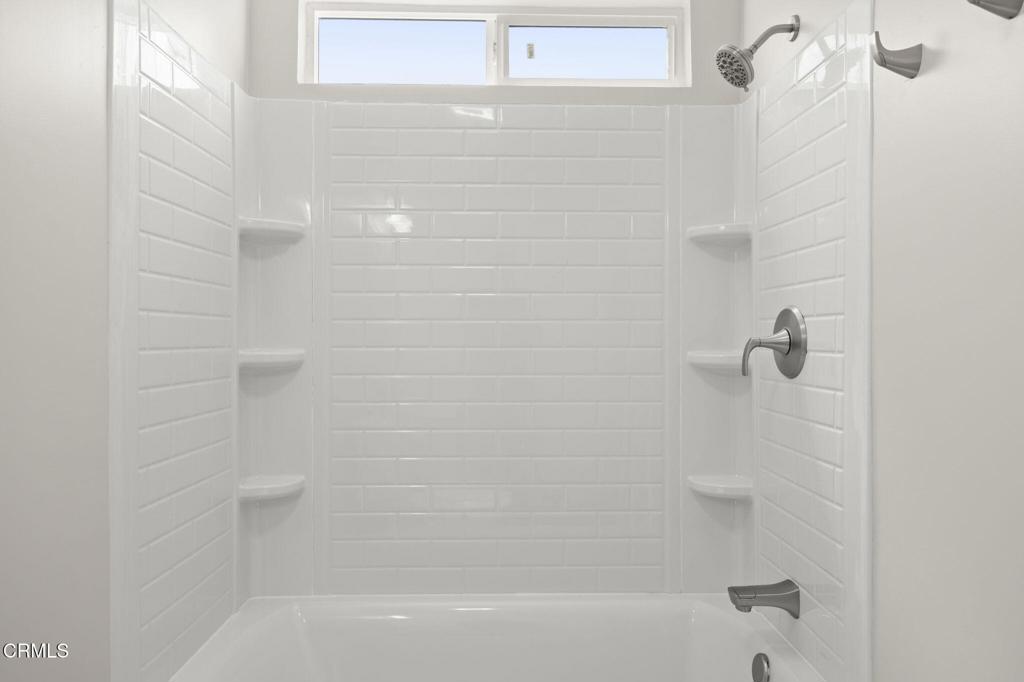 400 Dewberry Lane, Unit 101 Oxnard, CA 93036 - Photo 20 of 37 a bathroom with a bathtub