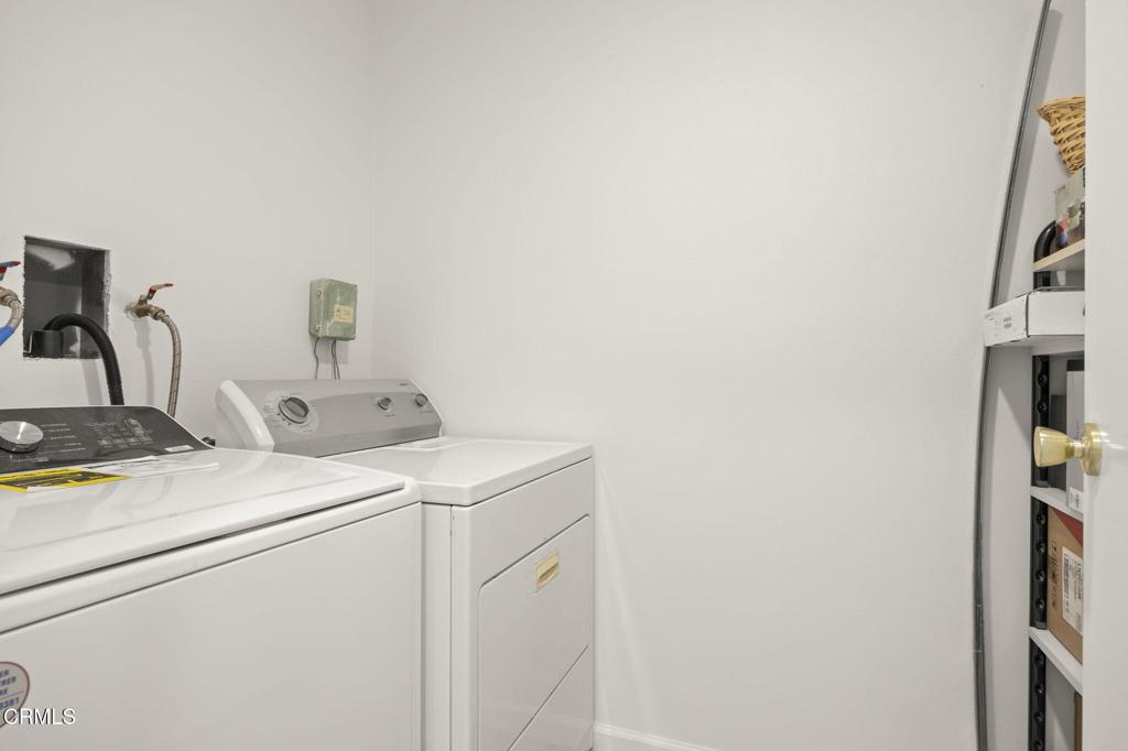 400 Dewberry Lane, Unit 101 Oxnard, CA 93036 - Photo 25 of 37 a utility room with dryer and washer