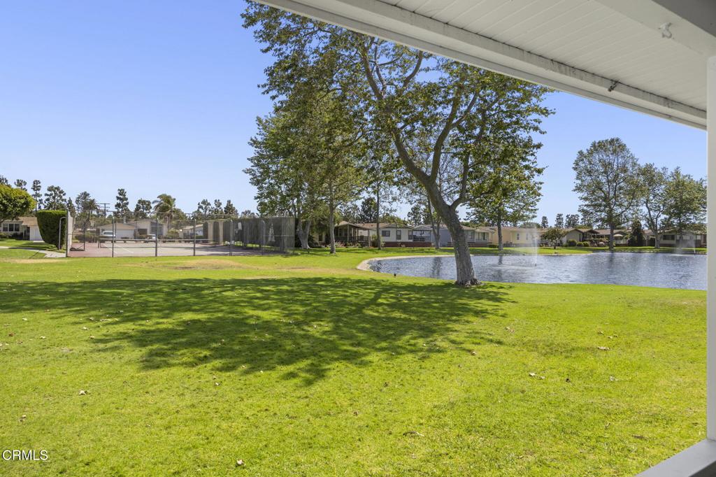400 Dewberry Lane, Unit 101 Oxnard, CA 93036 - Photo 28 of 37 a view of a golf course with a lake view