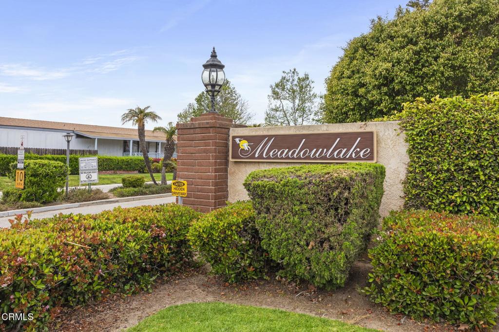 400 Dewberry Lane, Unit 101 Oxnard, CA 93036 - Photo 36 of 37 a sign on the side of a building