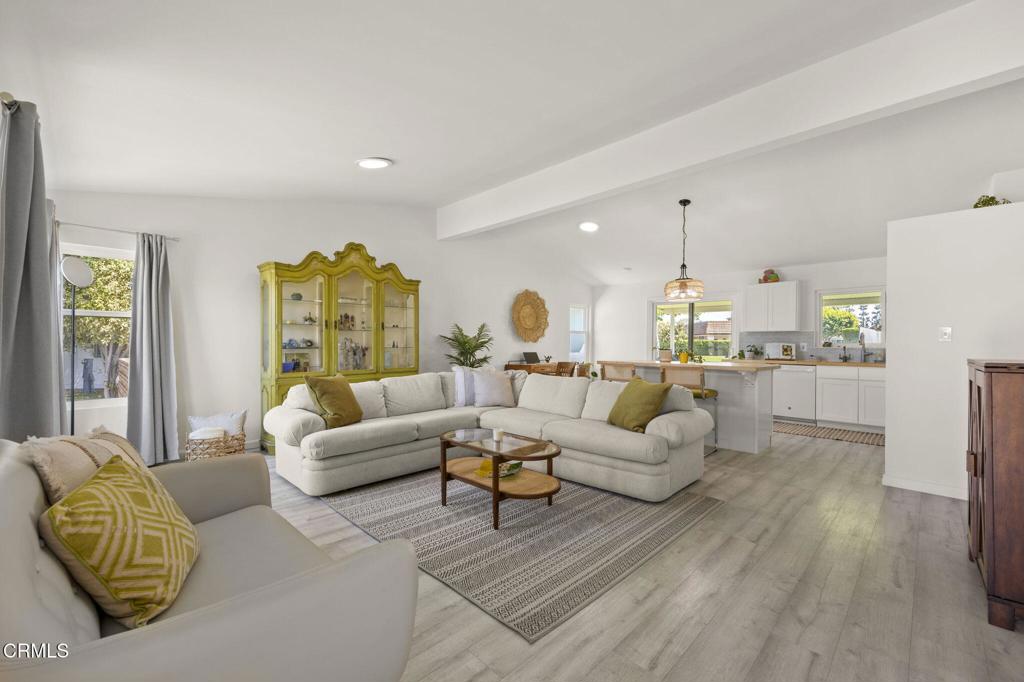 400 Dewberry Lane, Unit 101 Oxnard, CA 93036 - Photo 5 of 37 a living room with furniture and a large window