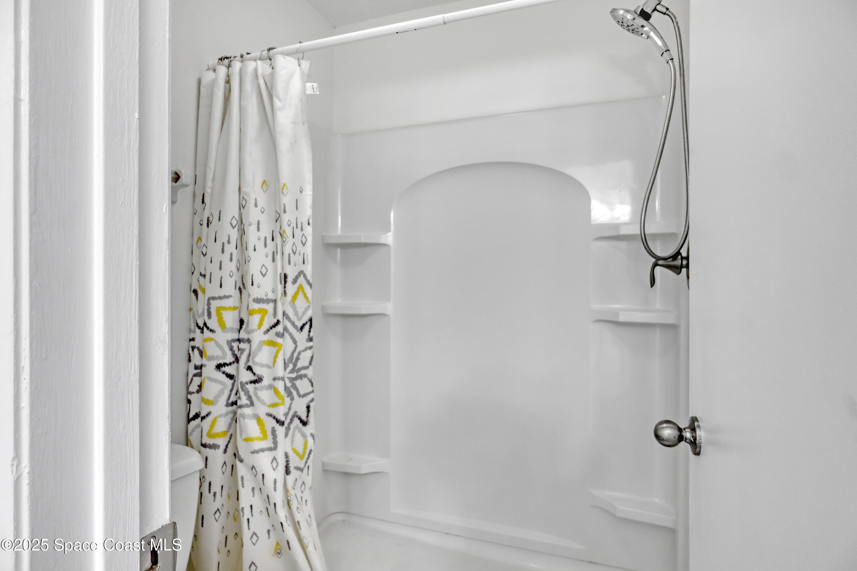 1031 Abada Court Northeast, Unit 110 Palm Bay, FL 32905 - Photo 22 of 33 a bathroom with a shower