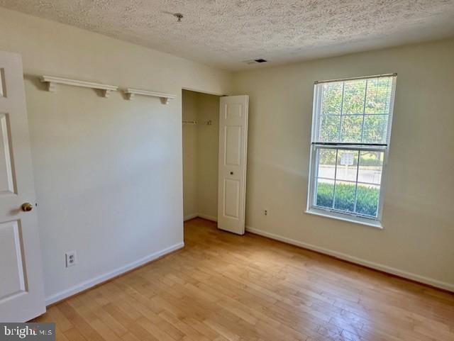 696 Winding Stream Way, Unit 104 Odenton, MD 21113 - Photo 16 of 21 a view of an empty room with a window