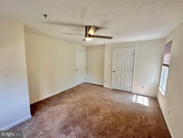 696 Winding Stream Way, Unit 104 Odenton, MD 21113 - Photo 18 of 21 a view of an empty room with a window