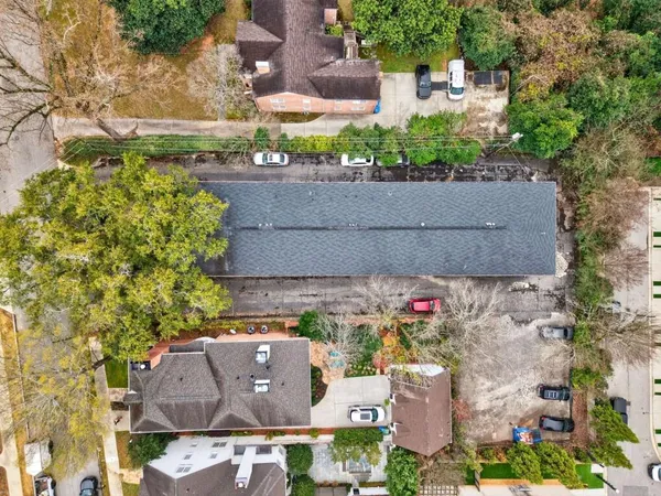 an aerial view of house with yard