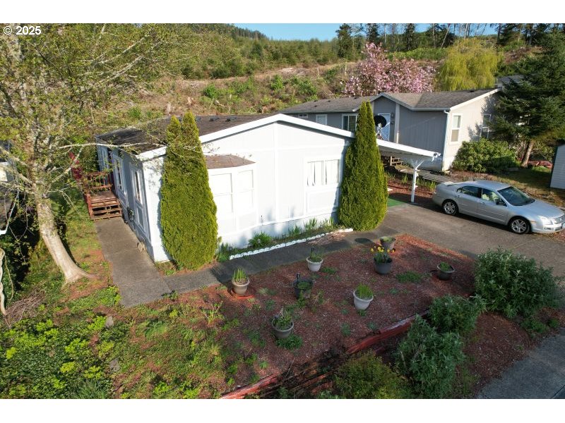 481 Hillside Loop Seaside, OR 97138 - Photo 1 of 47 a view of a backyard