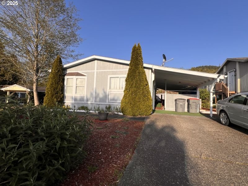 481 Hillside Loop Seaside, OR 97138 - Photo 12 of 47 a view of a house with a outdoor space