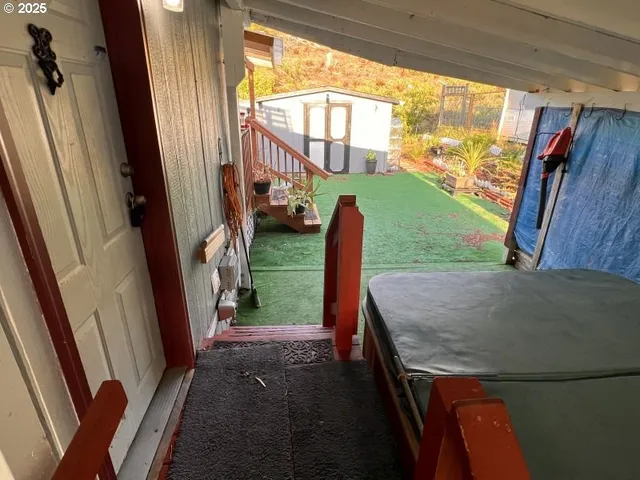 a view of a porch with furniture