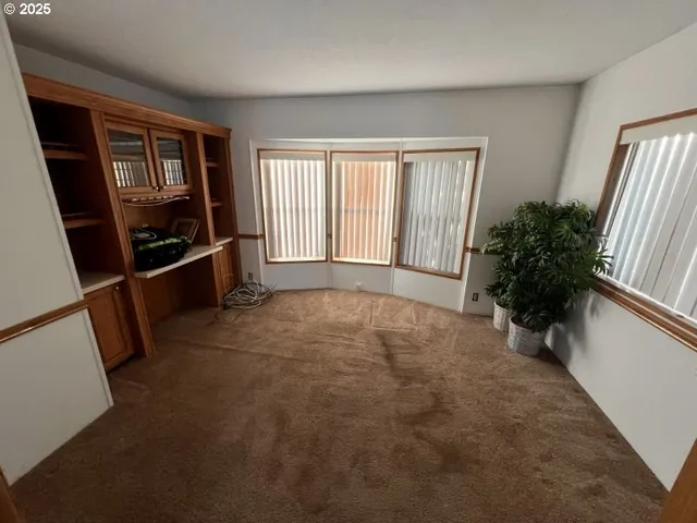 an entryway door with a mirror