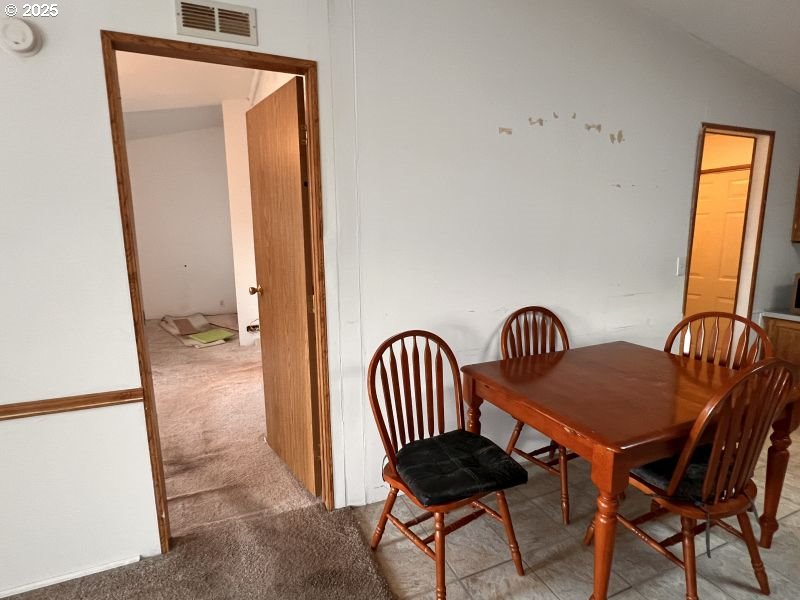481 Hillside Loop Seaside, OR 97138 - Photo 40 of 47 a view of a hallway with furniture and front door