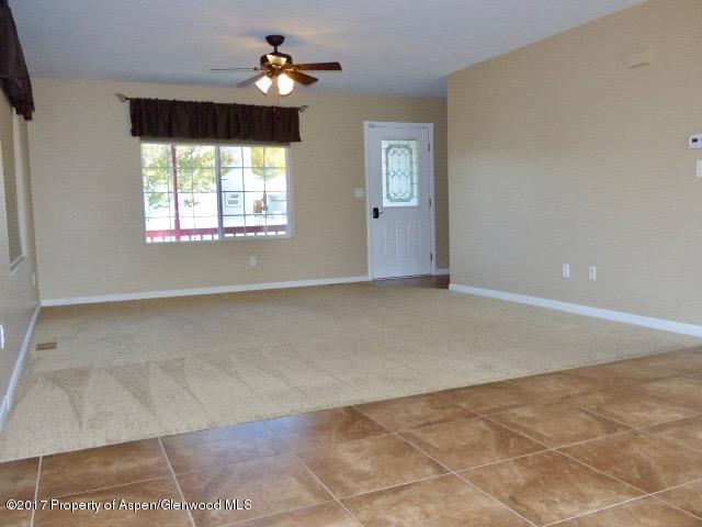 2722 Howard Avenue Rifle, CO 81650 - Photo 8 of 21 dining into living room