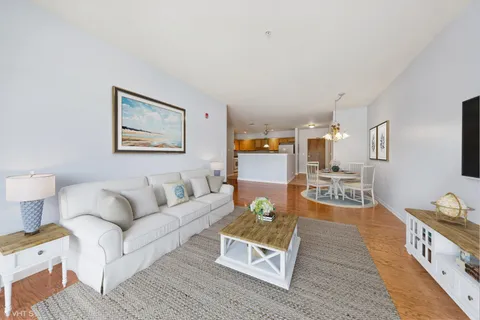 a living room with furniture and a table