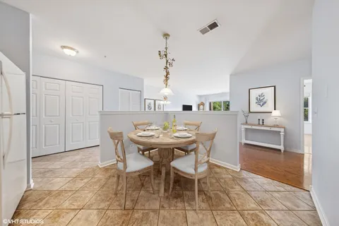 a view of a dining room with furniture