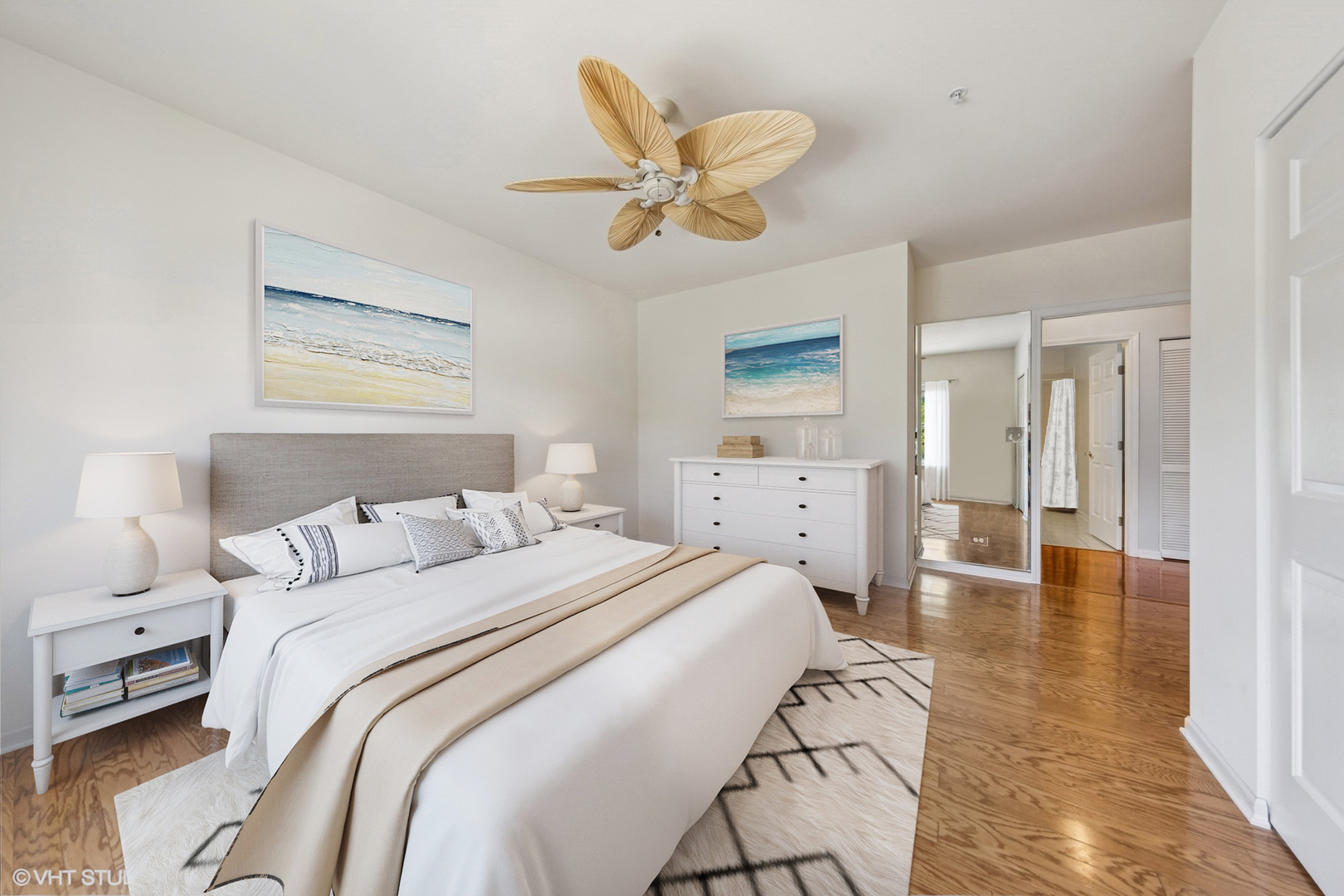 965 Rogers Street, Unit 202 Downers Grove, IL 60515 - Photo 9 of 15 a bedroom with a bed and a chandelier