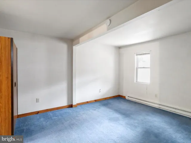 an empty room with window