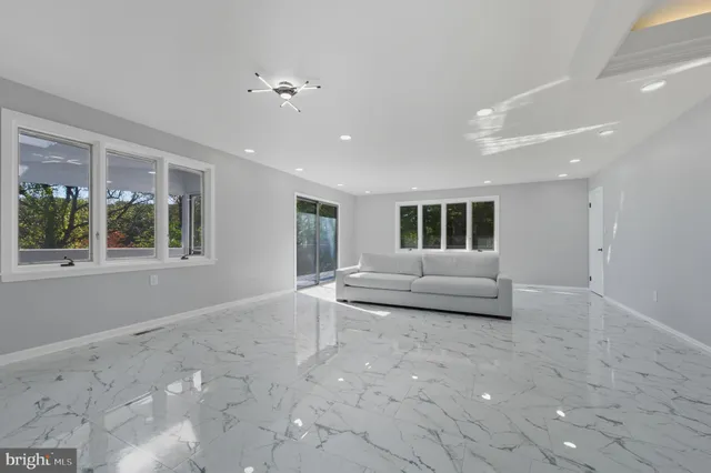 a bathroom with a shower and a sink