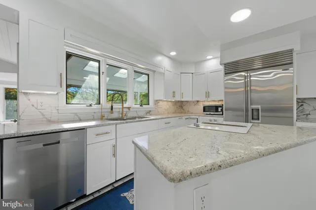 a view of a bathroom from a hallway