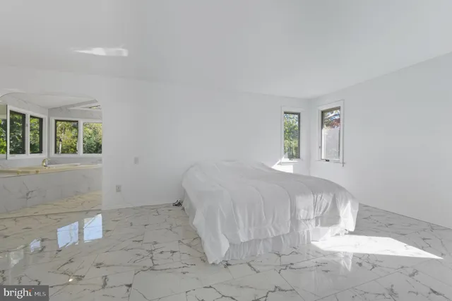 a view of balcony with wooden floor