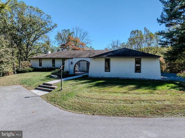 a view of a hallway with a couch
