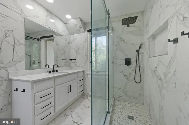 an aerial view of residential house with outdoor space