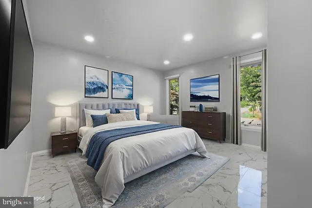 a view of a city with lush green forest