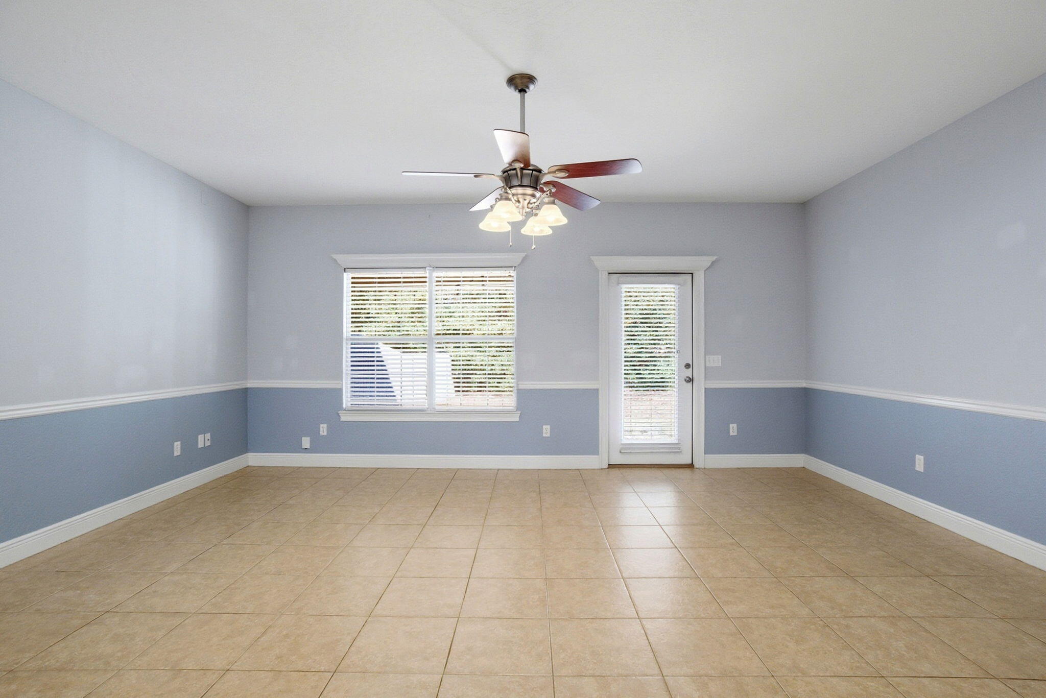 8562 Laredo Street Navarre, FL 32566 - Photo 14 of 43 a view of an empty room with a window