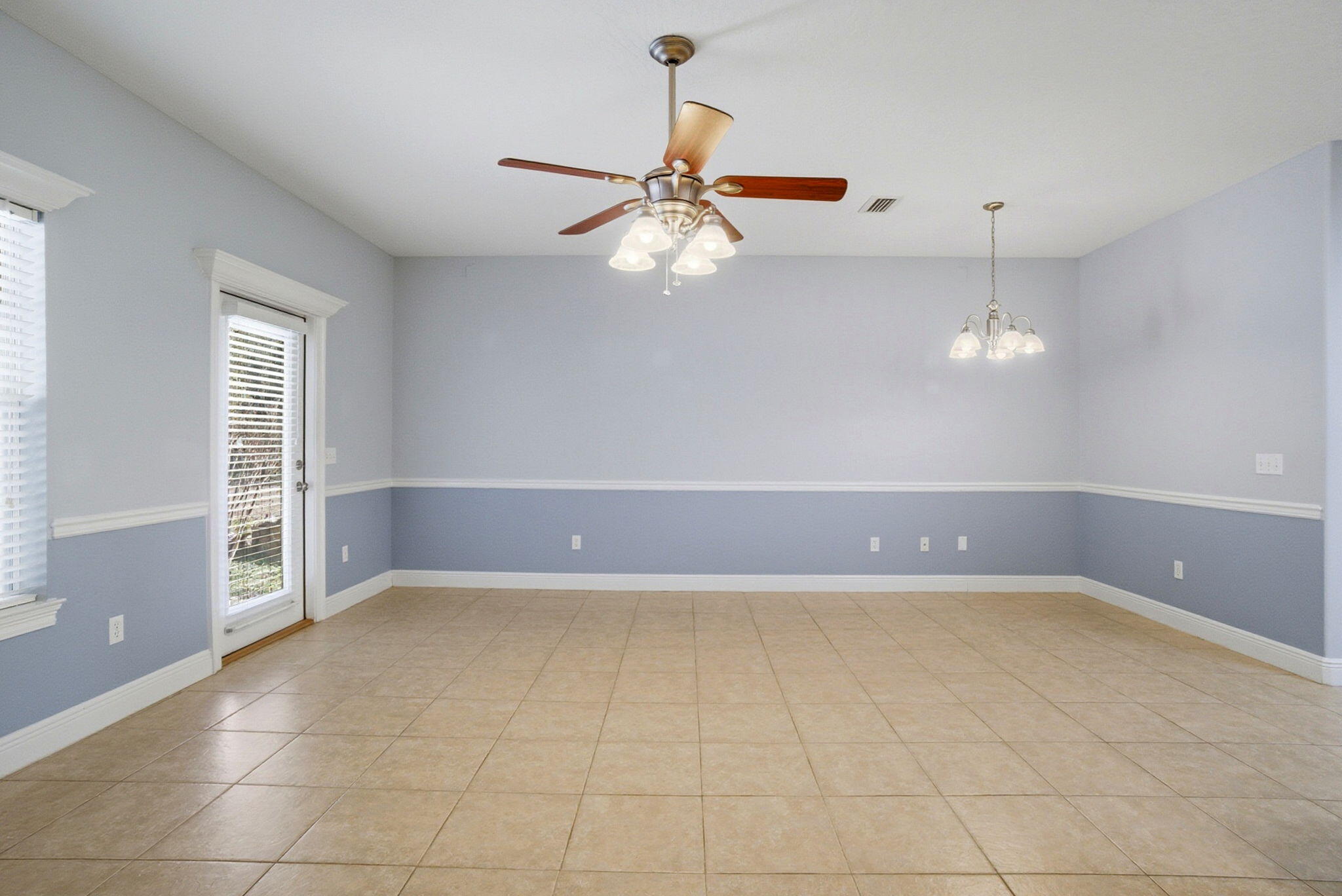 8562 Laredo Street Navarre, FL 32566 - Photo 15 of 43 a view of an empty room with a window
