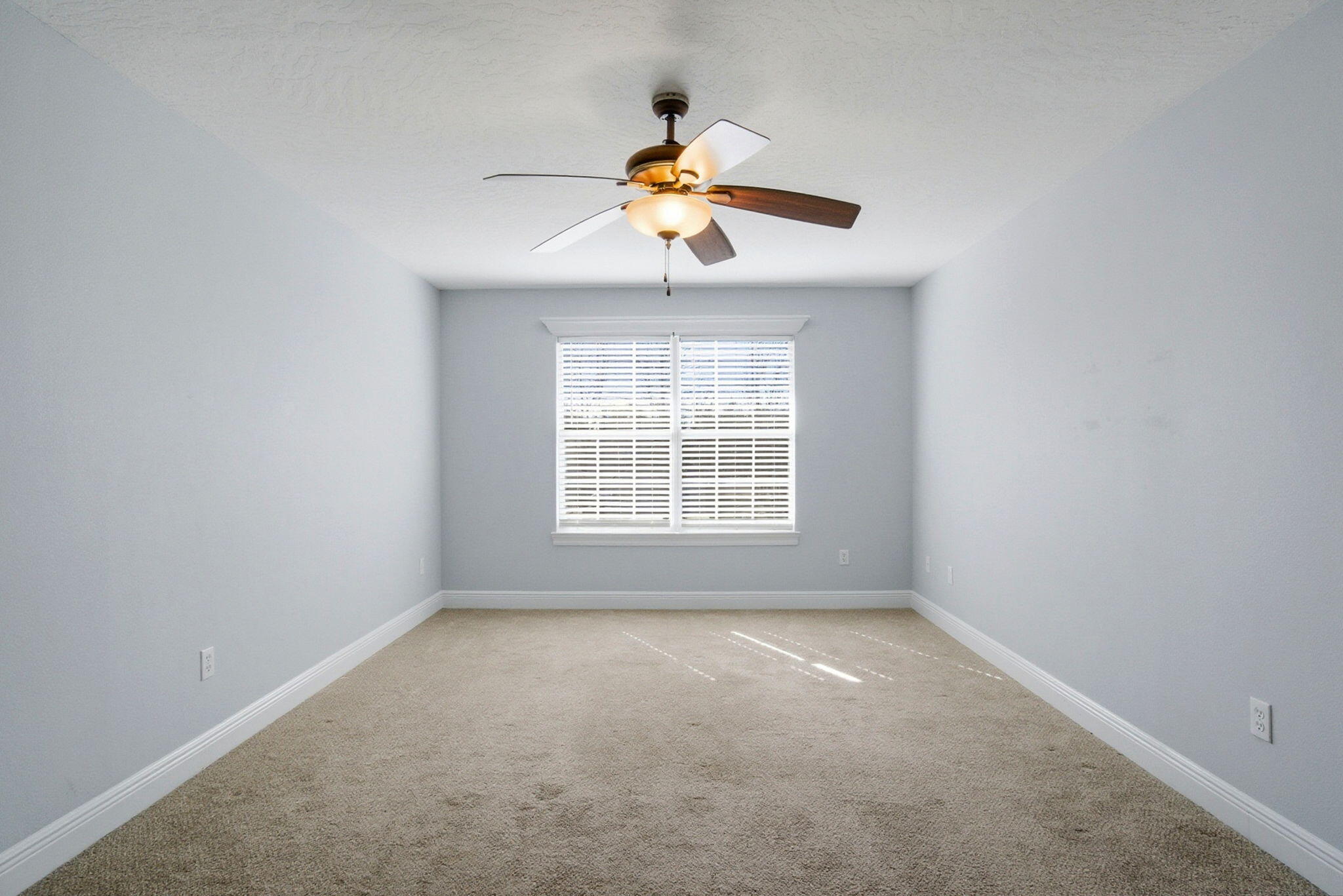 8562 Laredo Street Navarre, FL 32566 - Photo 22 of 43 a view of room with window and ceiling fan