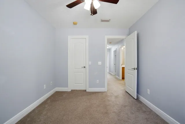 a view of a room with racks on the wall