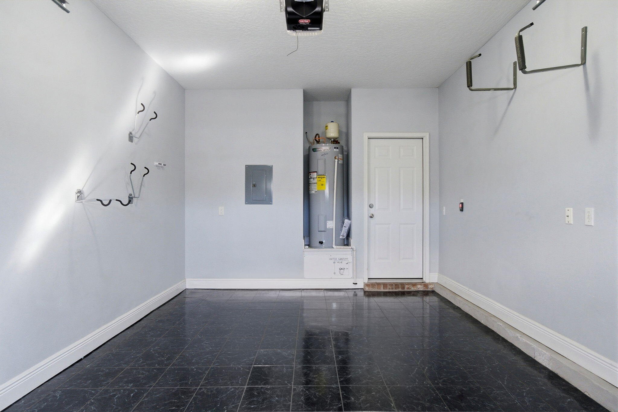 8562 Laredo Street Navarre, FL 32566 - Photo 35 of 43 an empty room with wooden floor and windows