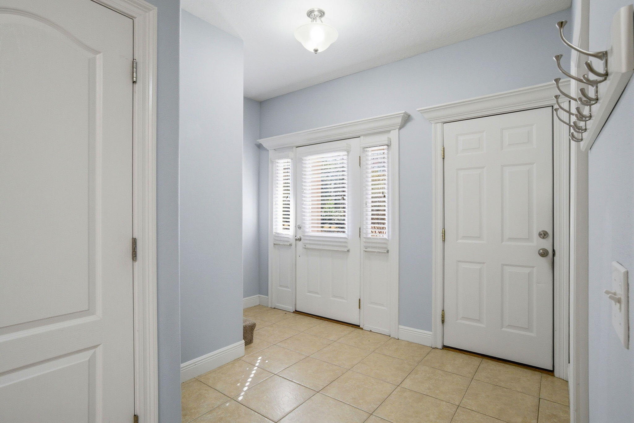 8562 Laredo Street Navarre, FL 32566 - Photo 6 of 43 a view of an empty room with window