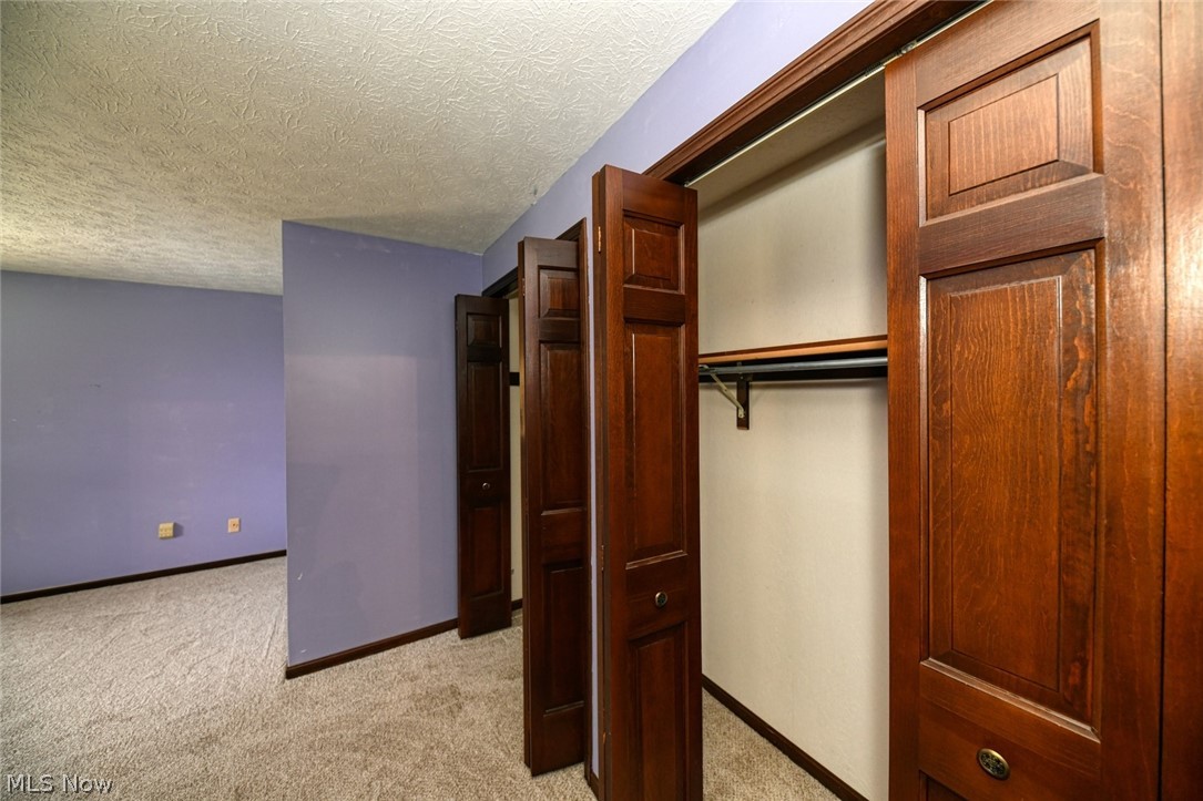 915 Sandy Lake Road Kent, OH 44240 - Photo 25 of 35 This room is spacious and has 2 closets.