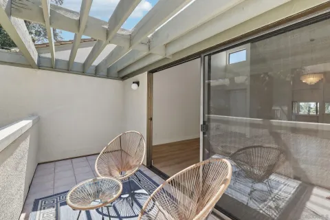 a room with table and chairs