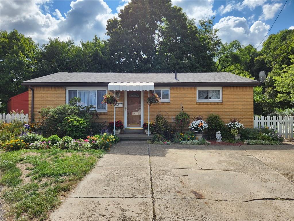 9 South Spring Street Pittsburgh, PA 15223 - Photo 1 of 22 a front view of a house with garden