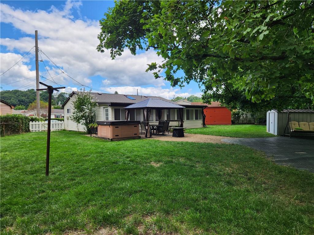 9 South Spring Street Pittsburgh, PA 15223 - Photo 12 of 22 a view of an house with backyard space and balcony