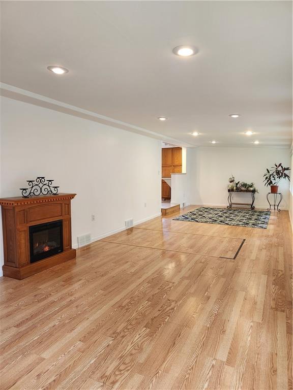 9 South Spring Street Pittsburgh, PA 15223 - Photo 7 of 22 a view of a kitchen with a sink and a fireplace