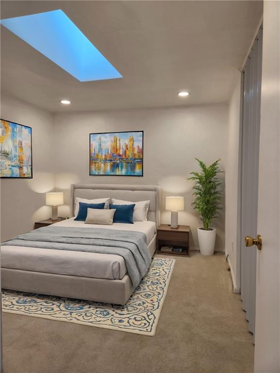 9 South Spring Street Pittsburgh, PA 15223 - Photo 9 of 22 a spacious bedroom with a bed a couch and potted plant