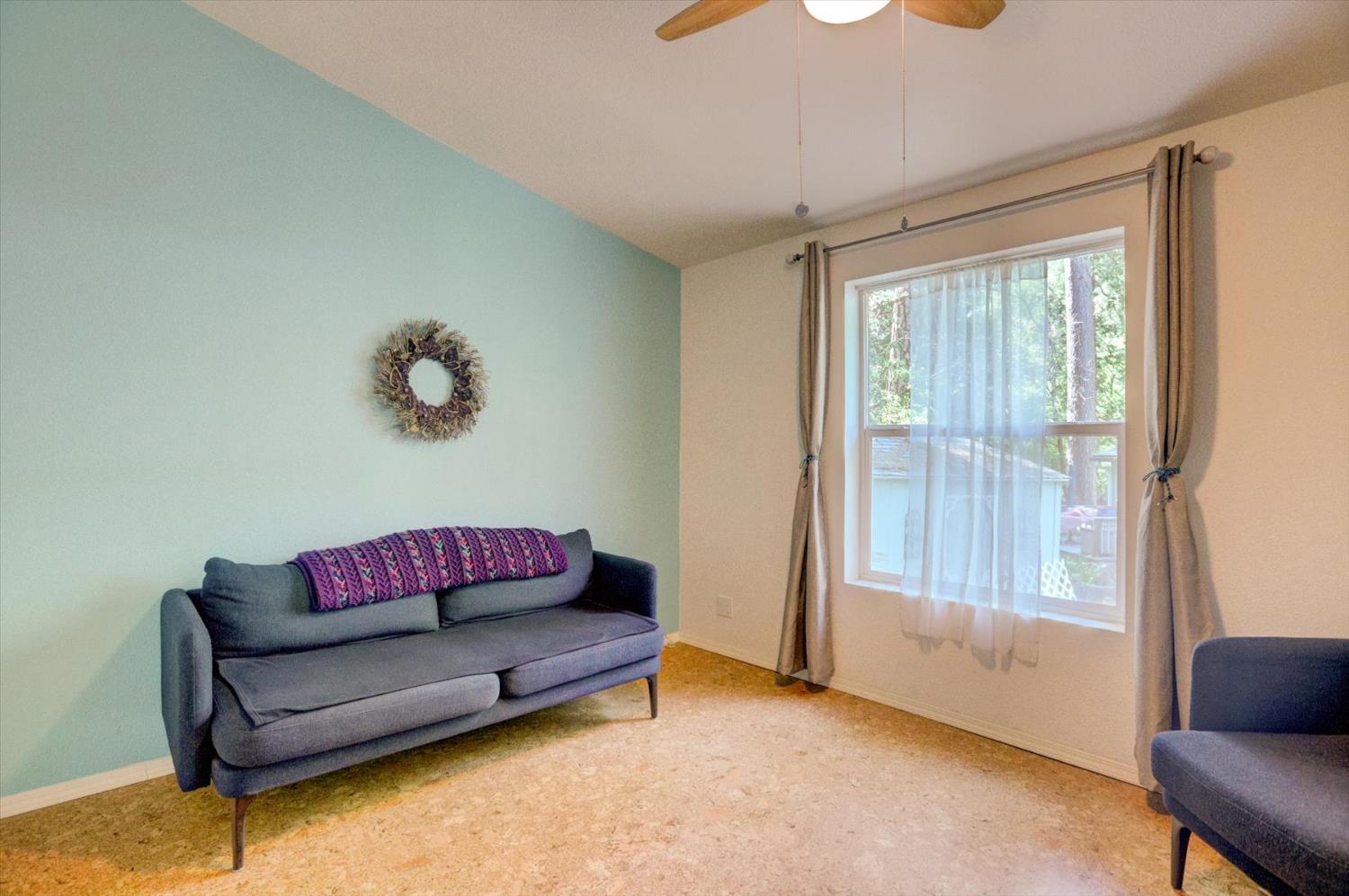 251 Willow Valley Road, Unit 17 Nevada City, CA 95959 - Photo 28 of 58 a living room with furniture and a window