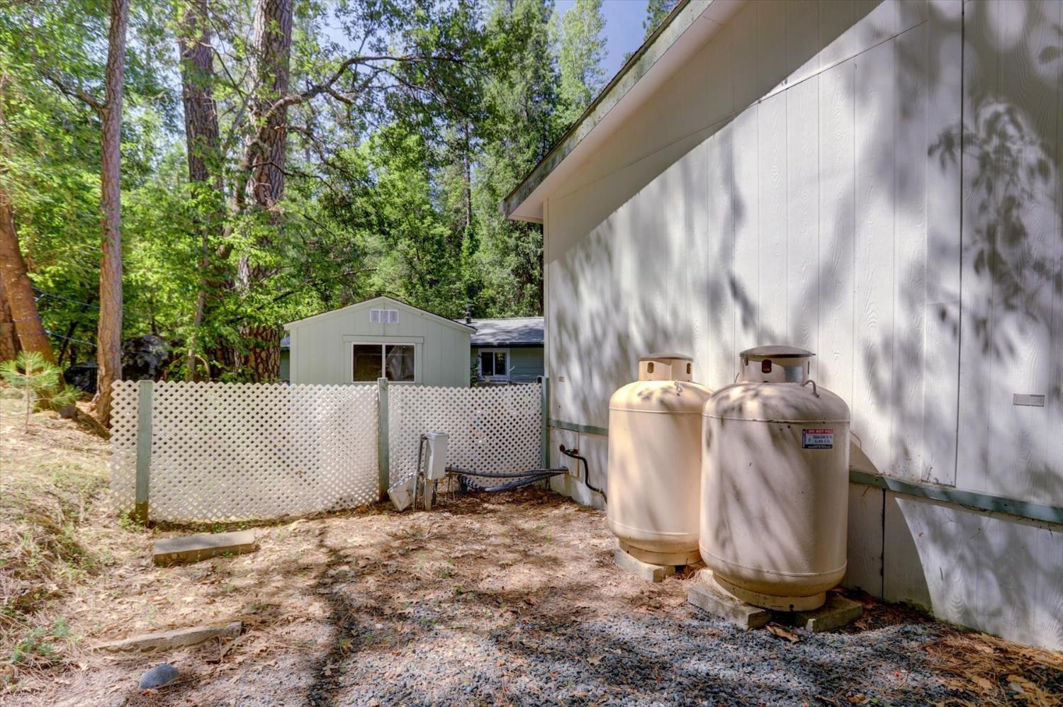 251 Willow Valley Road, Unit 17 Nevada City, CA 95959 - Photo 32 of 58 a view of a house with a yard