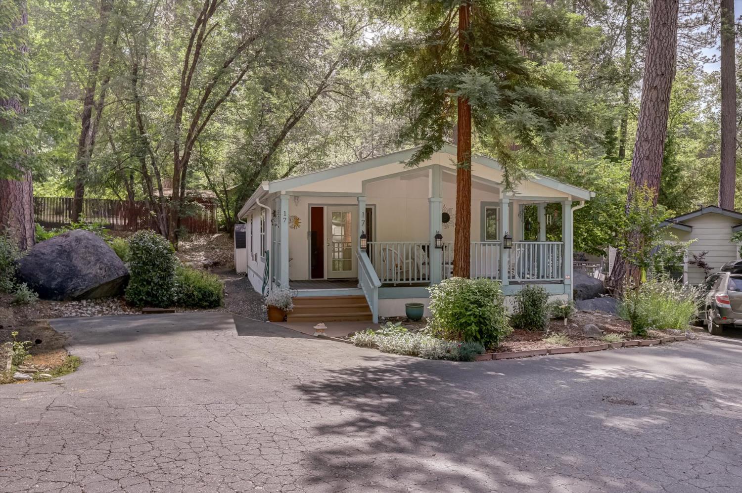 251 Willow Valley Road, Unit 17 Nevada City, CA 95959 - Photo 44 of 58 a view of a house with backyard and trees